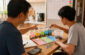 Balancing Education Costs with Adaptive Household Policies